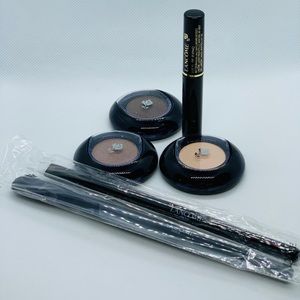 Lancôme mascara, eyeshadow and eye brushes.